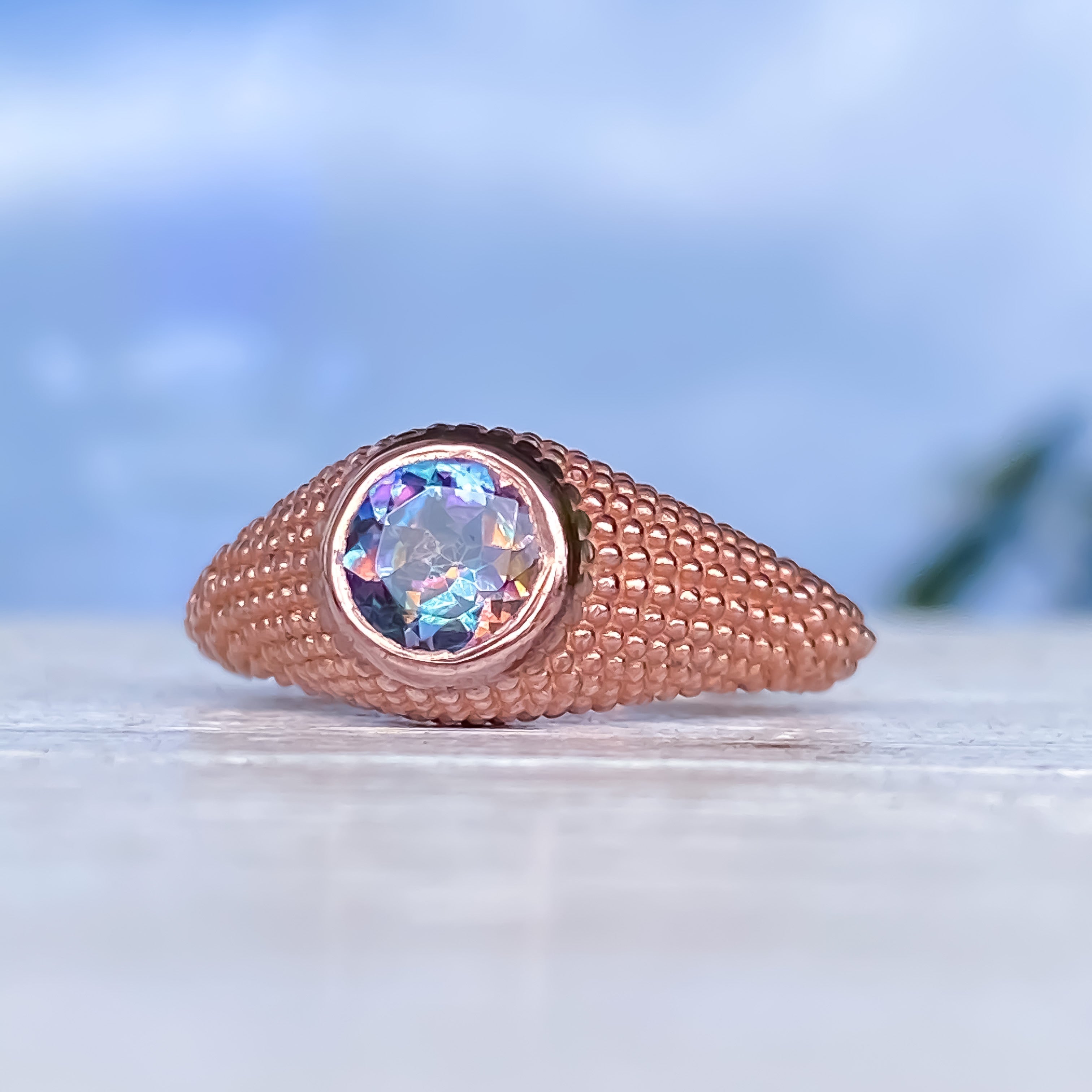 Bague Nubia ronde en or rose et topaze bleue, taille 7,25 US