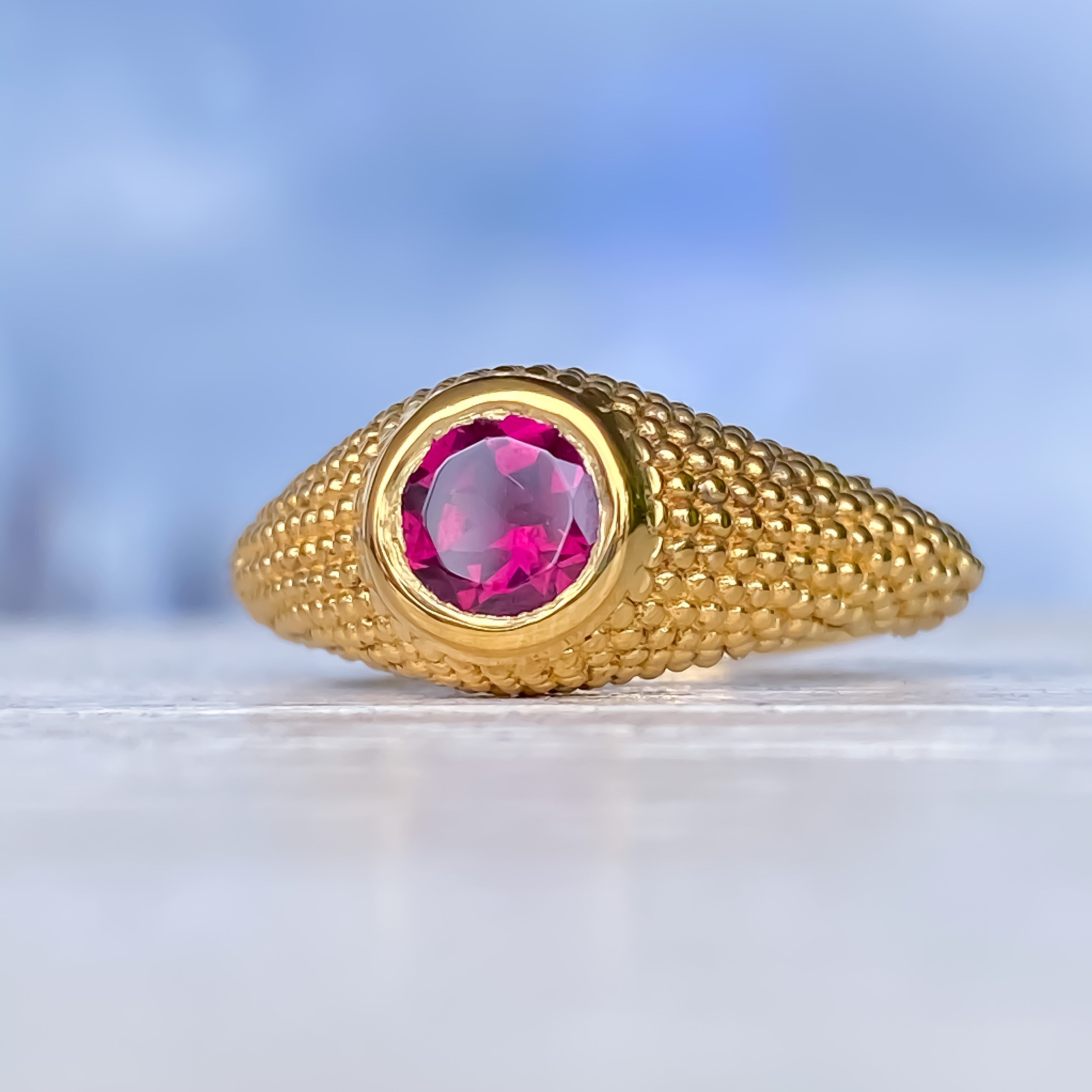 Bague Nubia en or jaune et rhodolite ronde, taille 7,25 US